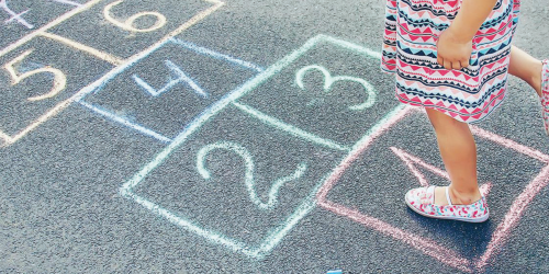 Child playing hopscotch